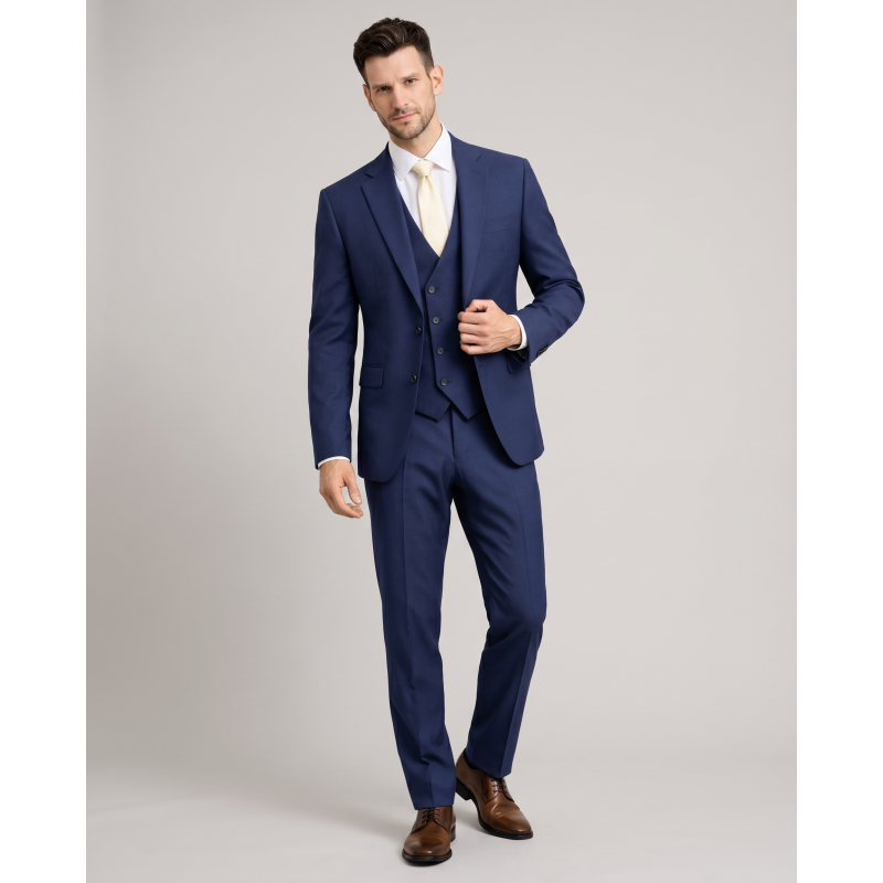 Elegantna moška tridelna obleka Verona M v modri barvi iz 100% volne. Slim fit kroj za popoln videz na porokah, poslovnih dogodkih in svečanih priložnostih. OKMAL.